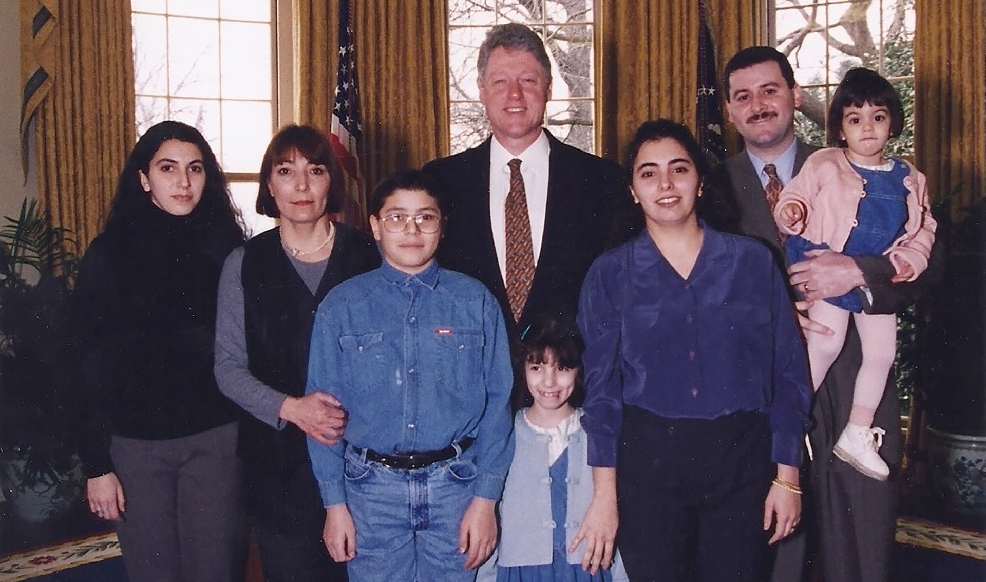 Young Jihan and her family with President Bill Clinton.